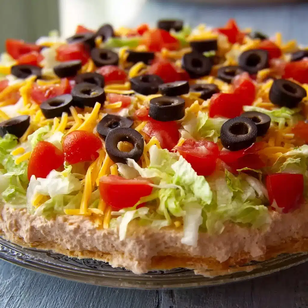 Taco Dip 5 This taco dip comes together in minutes and is sure to be a hit at your next get together Recipe - Recipe Image