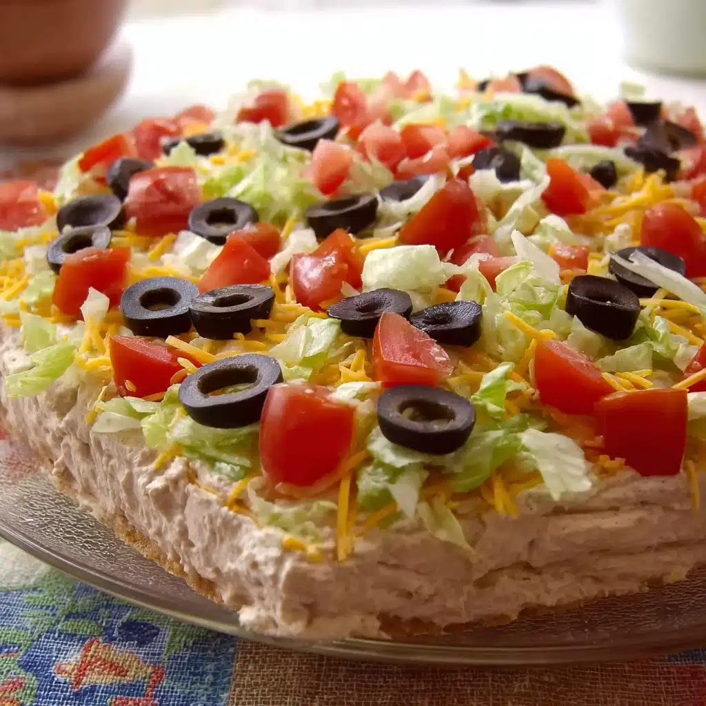 Taco Dip 4 This taco dip comes together in minutes and is sure to be a hit at your next get together Recipe - Recipe Image