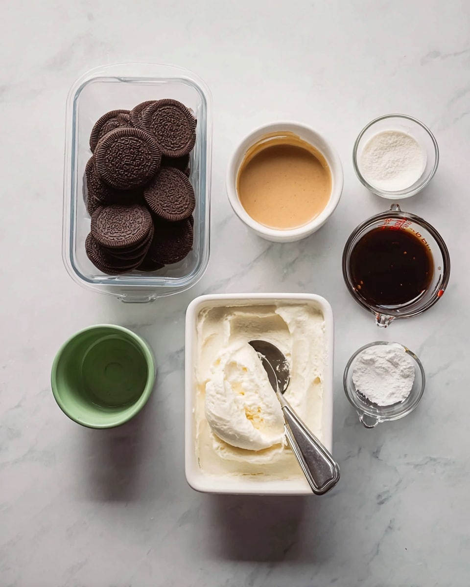 A top-down view shows six containers arranged on a white marbled surface, each holding different ingredients. On the left, a clear plastic container is full of dark brown round cookies stacked unevenly. In the center is a white rectangular container filled with a smooth, white creamy substance with a silver scoop resting inside. Above it, a small white bowl with a light brown sauce, and next to it, a tiny white bowl with white powder. To the right, a glass measuring cup shows some white liquid inside, and just above it, a small green cup holds a dark brown liquid. Photo taken with an iphone --ar 4:5 --v 7
