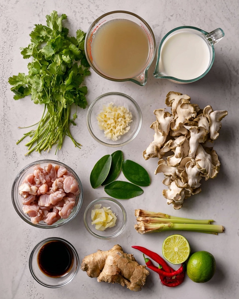 The image shows an overhead view of fresh cooking ingredients arranged neatly on a white marbled surface. In the bottom left, there is a clear glass bowl filled with small pink pieces of raw chicken meat. Above it, a larger clear glass bowl holds light brown broth. At the top left, fresh green cilantro sprigs lie next to a clear glass measuring cup filled with white coconut milk. To the right of the broth, clusters of light beige oyster mushrooms are placed in the center. Bright green lime leaves are positioned above the mushrooms. Next to the lime leaves is a small clear bowl with crushed garlic. Below laterally are two stalks of light green lemongrass and a ginger root with light brown skin and a smooth texture. A small glass bowl with dark soy sauce sits near the bottom right. Two small chilies, one red and one green, a wedge of lime, and a whole green lime are scattered at the bottom right corner. photo taken with an iphone --ar 4:5 --v 7
