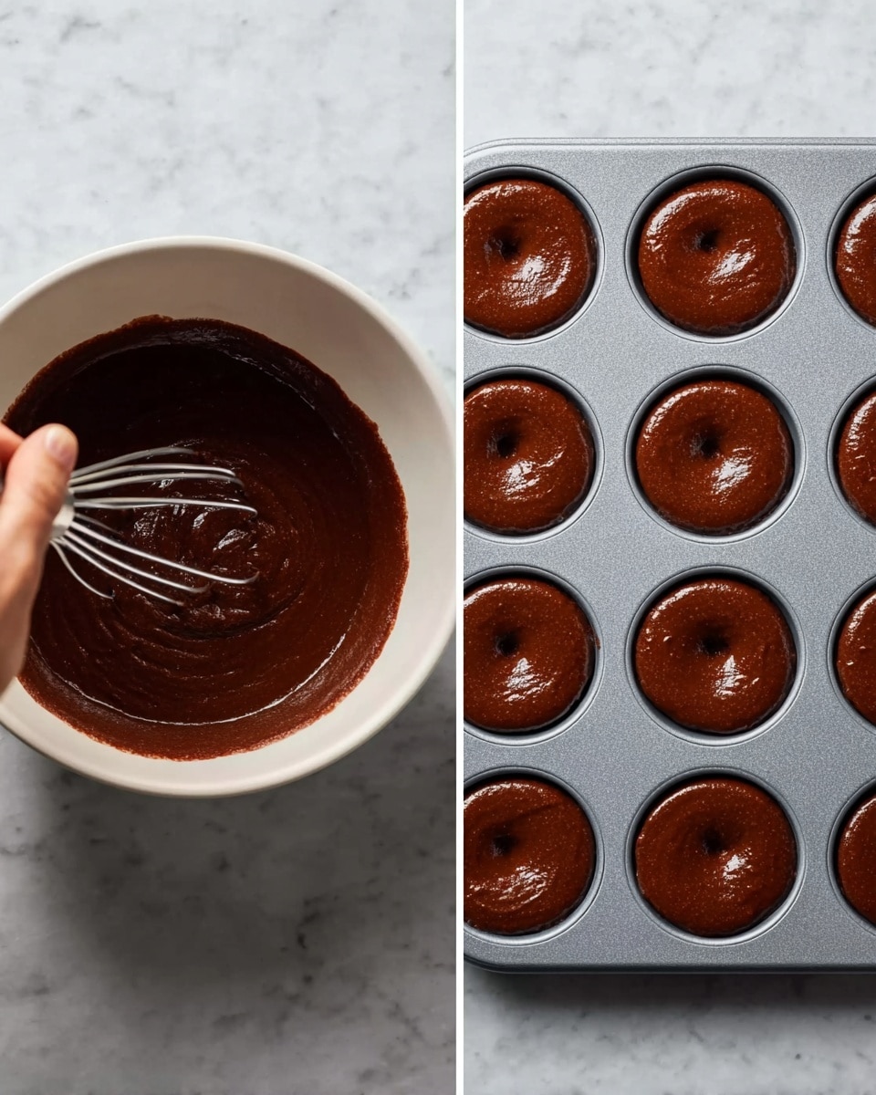 A stack of three donuts is placed on a white marbled surface. The top donut has a dark chocolate glaze with colorful rainbow sprinkles and one bite taken from it, showing the spongy chocolate inside. The middle donut has a light grayish glaze also covered with colorful sprinkles. The bottom donut is fully coated with a smooth dark chocolate glaze and dotted with scattered sprinkles. The donuts are round and soft, stacked neatly one on top of the other. Photo taken with an iphone --ar 4:5 --v 7