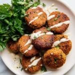 Crispy Homemade Falafel with Tahini, Tzatziki, and Hummus Recipe