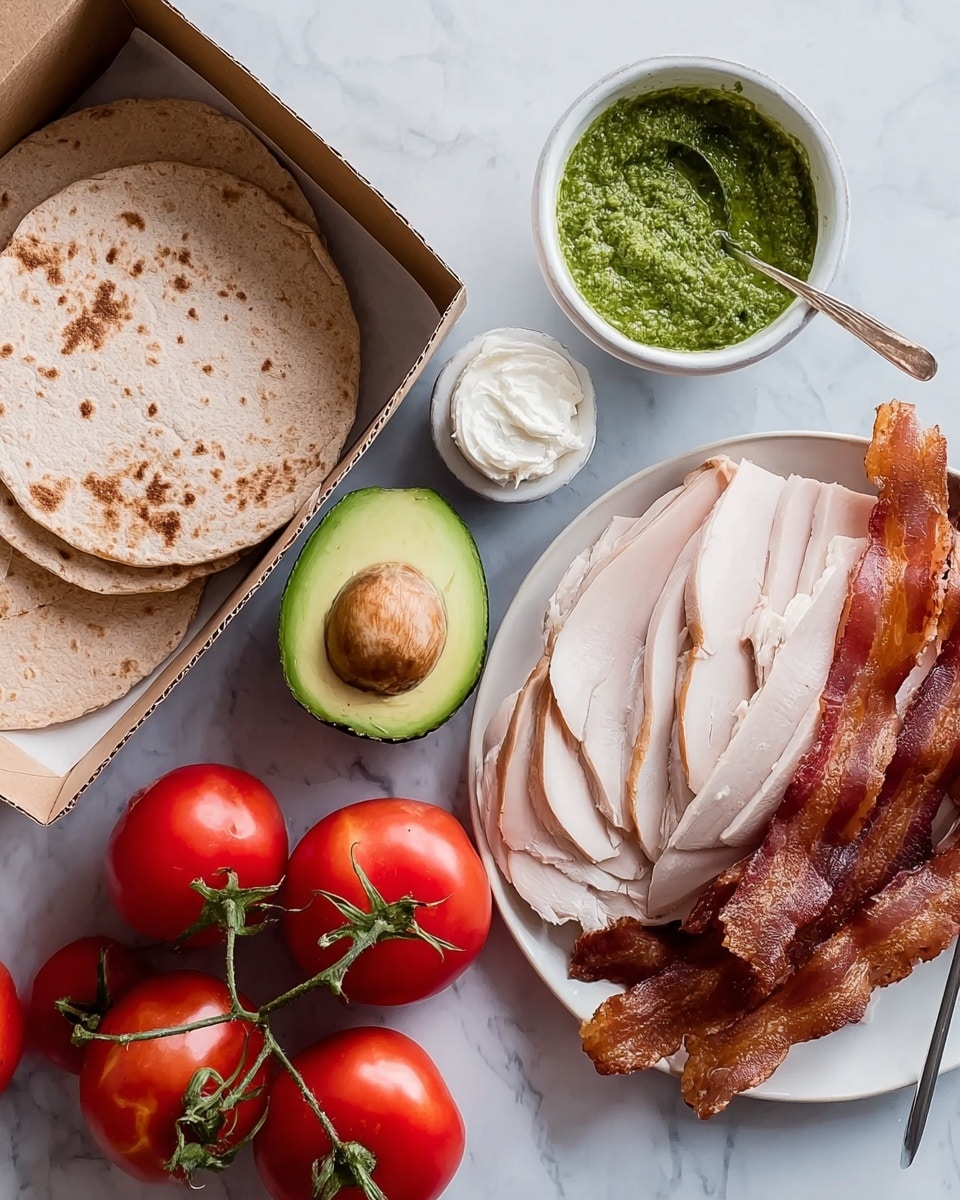 In the image, there are two round sandwich thins in a brown open box on the left. Below them is a small bunch of bright red tomatoes with green stems attached, resting on a white marbled surface. Near the center is a small white bowl filled with green pesto sauce, and next to it is a halved avocado showing its green flesh and brown seed. To the right is a white plate with several slices of pale deli turkey arranged in a neat stack. In front of the turkey is another white plate with several crispy brown bacon strips layered on top of each other. A spatula with a round scoop of cream cheese is placed near the bacon plate. All items are placed on a white marbled surface photo taken with an iphone --ar 4:5 --v 7