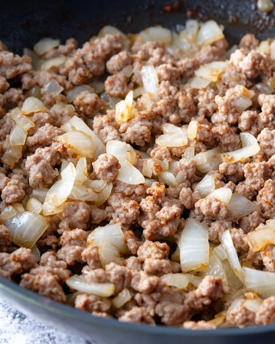 The image shows a white baking dish filled with a cheesy layered casserole. The bottom layer has a mix of cooked ground meat and chopped red bell peppers, with a slightly browned melted cheese layer on top, giving it a yellow and golden texture. On the top right, there are slices of green avocado sprinkled with red seasoning. Near the center, there is a dollop of white sour cream with a few green onion pieces and a light dusting of red seasoning on it. A wooden spoon is scooping out a portion from the corner, showing the melted cheese and meat mixed together. The dish is placed on a white marbled surface with a mustard-colored textured cloth beside it. Photo taken with an iphone --ar 4:5 --v 7