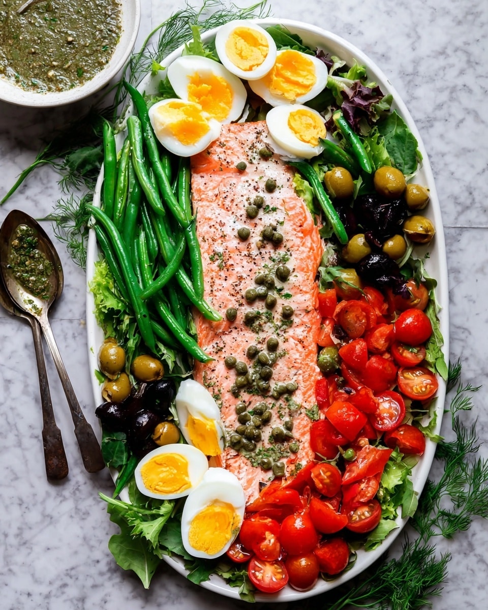 A white oval plate on a white marbled surface holds a large cooked salmon fillet in the center, pink with a slightly crisp top and sprinkled with small green capers. Surrounding the salmon are green beans arranged in bundles on both sides, bright red sliced tomatoes positioned in clusters to the lower left and upper right, and mixed olives in green and black colors near the top left and bottom right. Halved soft-boiled eggs with bright yellow yolks and seasoning are placed on the left and right sides of the plate. Fresh green leafy salad greens fill all remaining spaces around the salmon, providing a fresh look. A white bowl with green herb sauce and a spoon rests nearby. Photo taken with an iphone --ar 4:5 --v 7