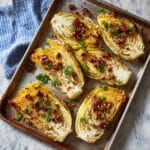 Crispy Roasted Cabbage Steaks with Pecans, Parmesan, and Fresh Herbs Recipe
