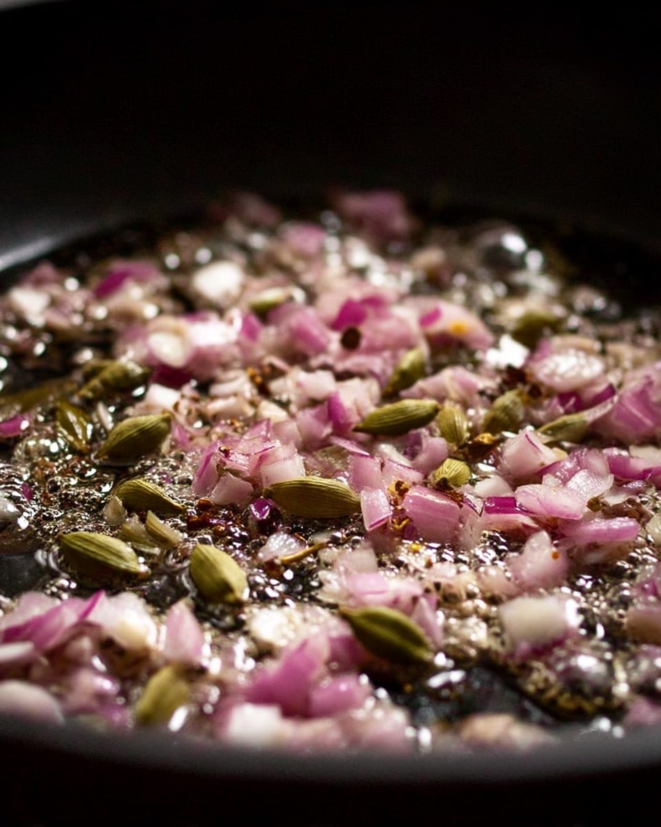A hammered copper bucket filled with a smooth, thick, light brown curry topped with small whole lentils and three small green herb leaves evenly placed on the surface. The bucket has a thin copper handle arching over, and it is placed against a dark background with soft light highlighting the texture of the curry and the copper. photo taken with an iphone --ar 4:5 --v 7