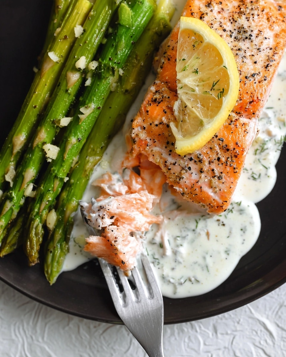 The image shows two raw salmon fillets with bright orange and light pink colors, lying flat on a black, speckled surface. One fillet is fully visible with its natural fat lines and a white area near the edge, while the other fillet is partially visible in the lower right corner with a more frosty texture. A white silicone brush with a wooden handle is brushing a light, translucent substance mixed with small pieces of minced garlic onto the top side of the complete fillet, highlighting the shiny, moist texture of the fish. The overall scene focuses on the fresh, glossy, and detailed texture of the salmon on a dark background. Photo taken with an iphone --ar 4:5 --v 7