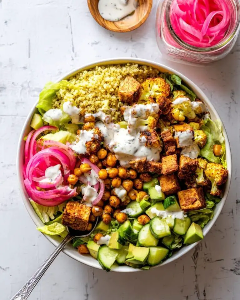 Roasted Cauliflower and Sweet Potato Buddha Bowl with Chickpeas and Tzatziki Recipe