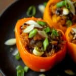 Eggplant Stuffed Bell Peppers with Fire-Roasted Tomatoes and Cilantro Recipe