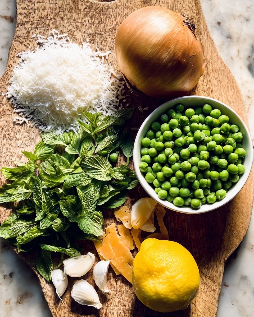 The image shows a wooden board with fresh ingredients arranged neatly. On the left side, there is a white pile of grated cheese next to a bunch of green basil and mint leaves. Near the middle, there is a whole golden-brown onion. To the top right, a white bowl filled with bright green peas stands out. Below the onion, there are two peeled garlic cloves beside some thin orange slices of cheese. On the far right, a lemon half with seeds visible sits on the board. The ingredients display a mix of textures from soft leaves to firm vegetables on a white marbled surface. photo taken with an iphone --ar 4:5 --v 7