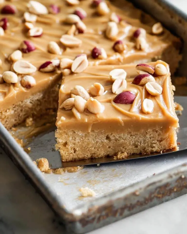 Peanut Butter Cake with Creamy Peanut Butter Frosting and Roasted Peanuts Recipe